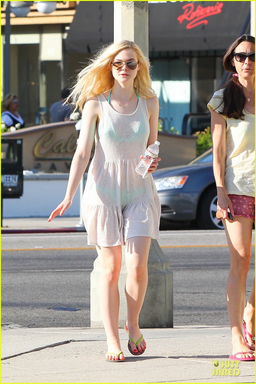 elle fanning shows bright bikini in sheer dress 18