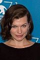 milla jovovich cradles baby bump at premiere 13