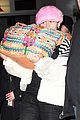 miley cyrus wears ring at airport 27