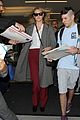kate upton arrives at airport 09