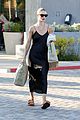 rosie huntington whiteley dons silk dress while grocery shopping 01