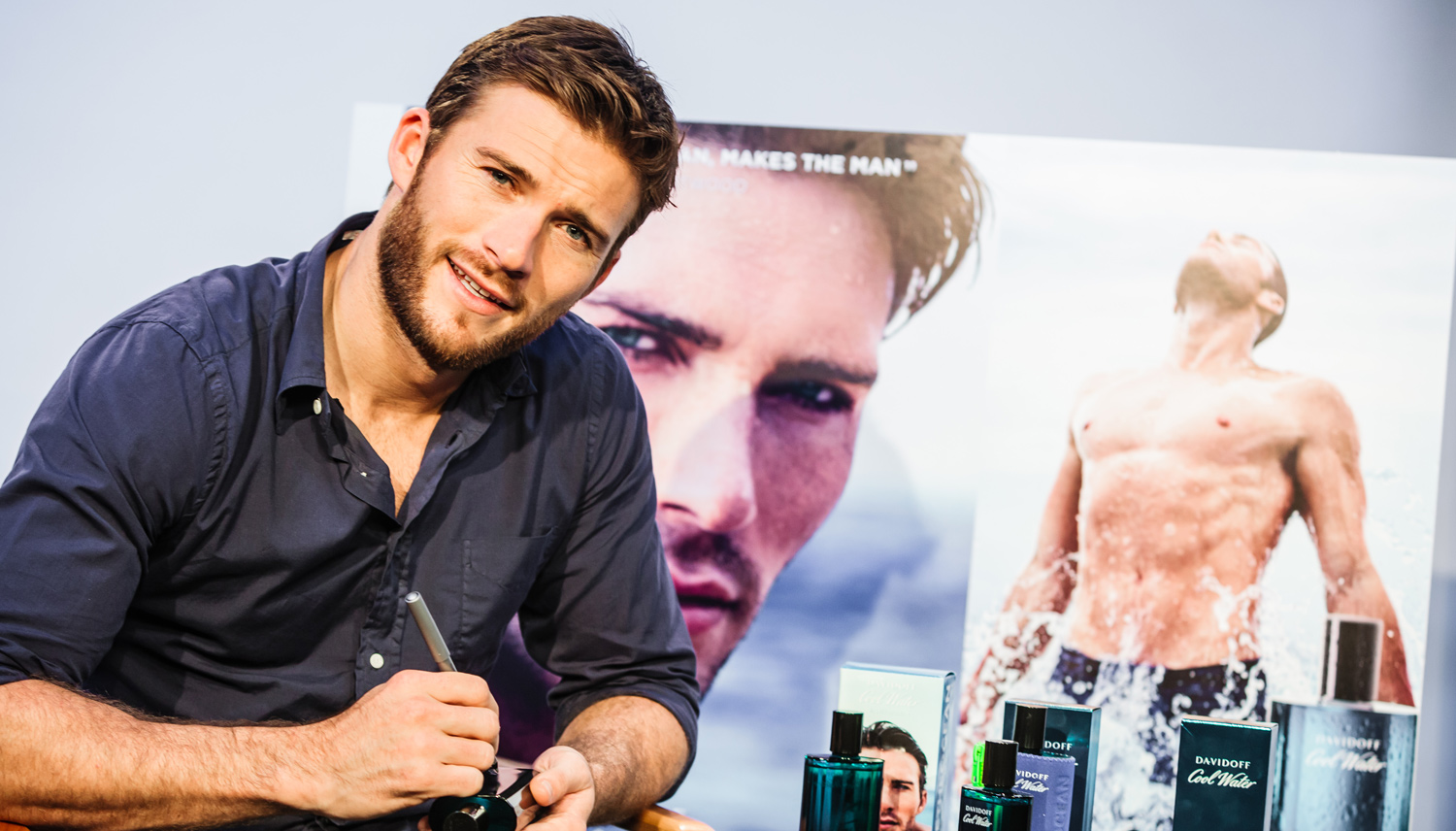 Scott Eastwood poses with a bottle of Davidoff Cool Water during a press da...