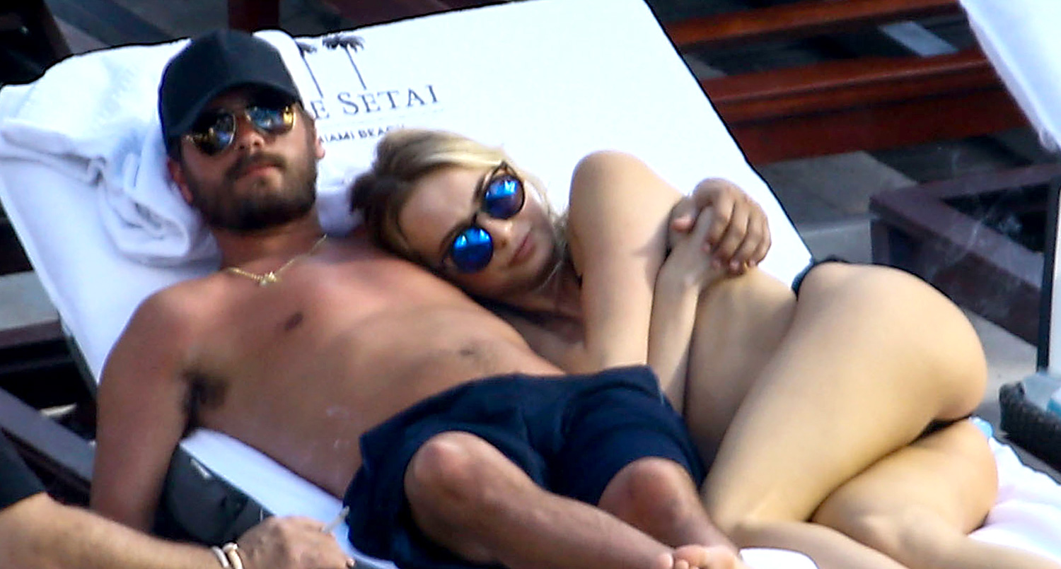 Scott Disick Cuddles By the Pool with Another Woman in Miami